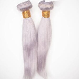 Light purple straight hair extensions with gold bands.