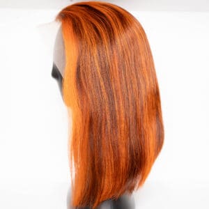 Vibrant orange straight hair wig from side.