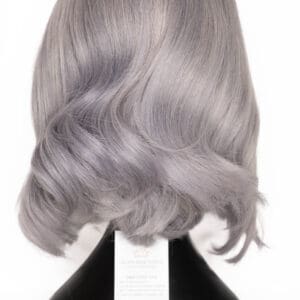 Short wavy gray hair wig on display.