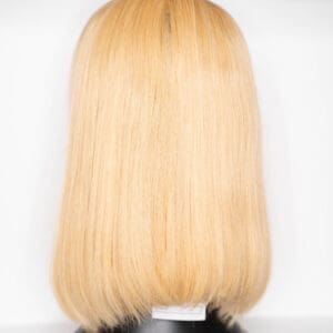 Blonde bob wig displayed on a mannequin.